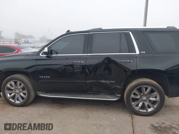 2016 Chevrolet Tahoe LTZ z VIN 1GNSCCKC2GR100879, wystawiony jako IAAI lot #41112832 z przebiegiem 213 649 mil mil oraz . Historia ofert i sprzedaży dostępna na DreamBid. Obrazek 14.
