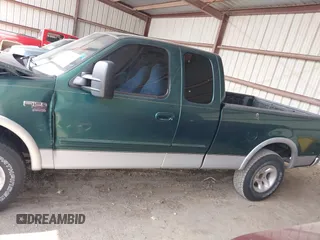 1999 Ford F-150 XL с VIN 1FTRX18L9XNA51887, выставлен на аукционе IAAI как лот 42498279 с пробегом Не указан миль и . История ставок и продаж доступна на DreamBid. Изображение 13.