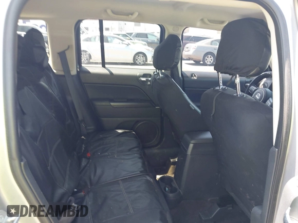 2015 Jeep Patriot Sport with VIN 1C4NJRBBXFD291890, listed as a IAAI auction lot 42570079 with 204,455 mi miles and . Bid and sale history available at DreamBid. Image 8.