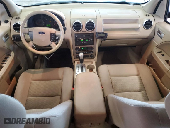2005 Ford Freestyle SEL z VIN 1FMDK02135GA60009, wystawiony jako Copart lot #52852755 z przebiegiem 248 780 mil mil oraz Szkody całkowita. Historia ofert i sprzedaży dostępna na DreamBid. Obrazek 8.