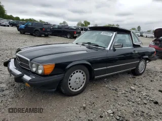 1986 Mercedes-Benz 560 SL z VIN WDBBA48D2GA050261, wystawiony jako Copart lot #58388025 z przebiegiem 199 750 mil mil oraz Tytuł czysty. Historia ofert i sprzedaży dostępna na DreamBid. Obrazek 1.