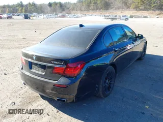 2015 BMW 7 Series 750Li xDrive with VIN WBAYF8C56FD654698, listed as a IAAI auction lot 41229313 with 120,238 mi miles and . Bid and sale history available at carsss.com. Image 4.