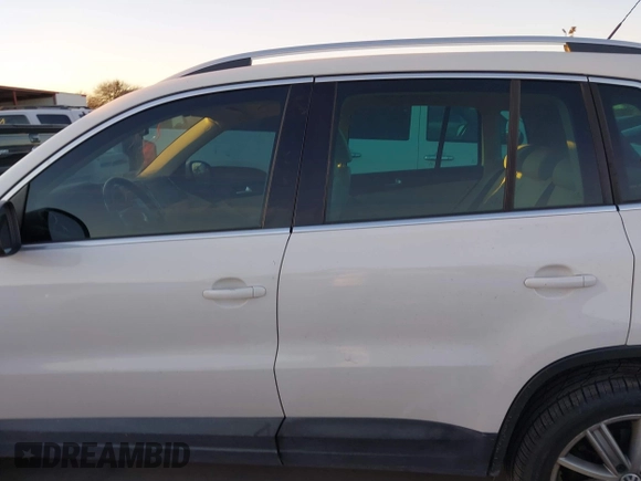 2010 Volkswagen Tiguan SEL with VIN WVGBV7AX4AW514362, listed as a IAAI auction lot 41413300 with 154,201 mi miles and . Bid and sale history available at DreamBid. Image 14.
