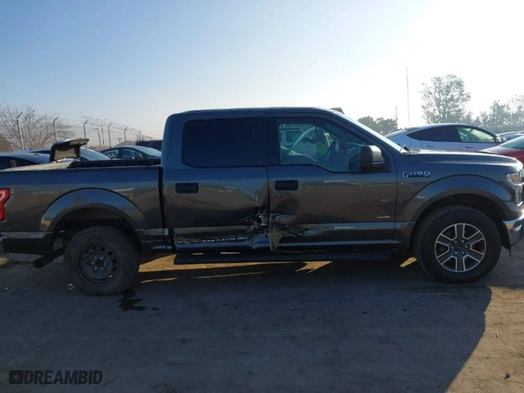 2015 Ford F-150 XL with VIN 1FTEW1CG7FKD37832, listed as a IAAI auction lot 41355567 with 194,633 mi miles. Bid and sale history available at carsss.com. Image 14.