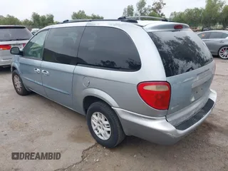 2003 Dodge Grand Caravan with VIN 1D4GP44383B252581, listed as a IAAI auction lot 41838754 with 164,773 mi miles and . Bid and sale history available at DreamBid. Image 3.