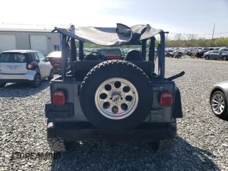 2002 Jeep Wrangler Sport with VIN 1J4FA49S92P715480, listed as a Copart auction lot 55157545 with 153,560 mi miles and Clean Title. Bid and sale history available at carsss.com. Image 7.