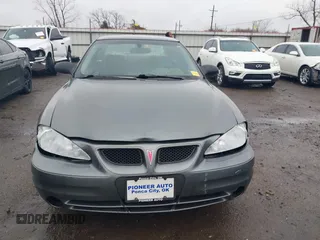 2003 Pontiac Grand Am SE1 with VIN 1G2NF52E03C273764, listed as a IAAI auction lot 41614581 with 208,369 mi miles. Bid and sale history available at carsss.com. Image 13.