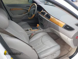 2002 Jaguar S-Type with VIN SAJDA01P12GM35163, listed as a IAAI auction lot 41097415 with 114,017 mi miles and . Bid and sale history available at DreamBid. Image 5.