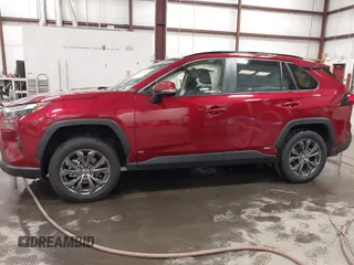 2023 Toyota RAV4 Hybrid XLE Premium with VIN JTMB6RFV4PD116495, listed as a IAAI auction lot 42588604 with 24,258 mi miles and . Bid and sale history available at DreamBid. Image 14.