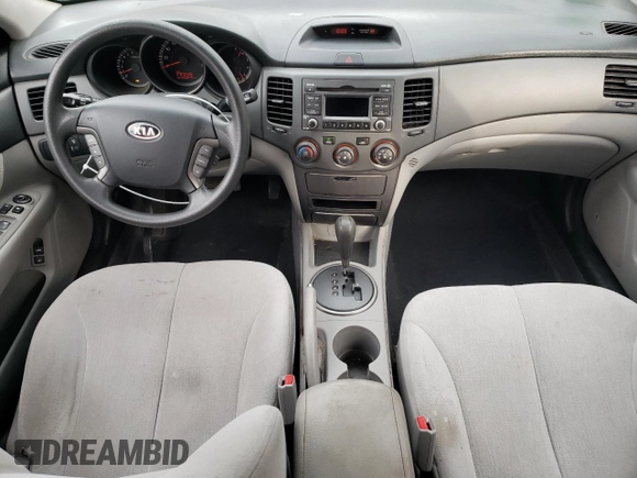 2010 Kia Optima LX z VIN KNAGG4A86A5412138, wystawiony jako Copart lot #76032543 z przebiegiem 140 045 mil mil oraz Czysty tytuł • Clean title. Historia ofert i sprzedaży dostępna na DreamBid. Obrazek 8.