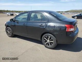2012 Toyota Yaris with VIN JTDBT4K30CL010867, listed as a Copart auction lot 54128955 with 245,262 mi miles and Salvage Title. Bid and sale history available at carsss.com. Image 2.