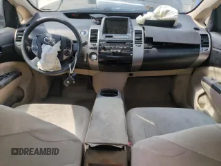 2005 Toyota Prius z VIN JTDKB20U453074321, wystawiony jako Copart lot #58217285 z przebiegiem 299 999 mil mil oraz Szkoda całkowita • Salvage title. Historia ofert i sprzedaży dostępna na DreamBid. Obrazek 8.