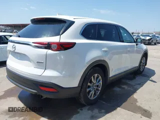 2019 Mazda CX-9 Touring z VIN JM3TCBCY2K0300702, wystawiony jako IAAI lot #42194050 z przebiegiem 98 247 mil mil oraz . Historia ofert i sprzedaży dostępna na DreamBid. Obrazek 4.