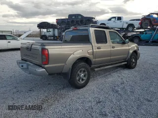 2003 Nissan Frontier XE with VIN 1N6ED27T73C433384, listed as a Copart auction lot 80153654 with 248,803 mi miles and Salvage title. Bid and sale history available at DreamBid. Image 3.