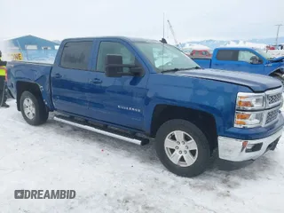 2015 Chevrolet Silverado 1500 LT with VIN 3GCUKREC5FG198758, listed as a IAAI auction lot 41573360 with 150,562 mi miles and . Bid and sale history available at DreamBid. Image 1.