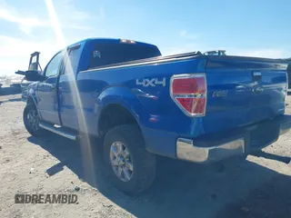 2014 Ford F-150 XL with VIN 1FTFX1EF2EFC25761, listed as a IAAI auction lot 41610999 with 265,989 mi miles. Bid and sale history available at carsss.com. Image 3.