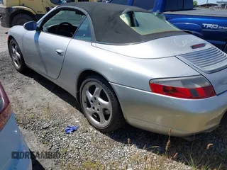 1999 Porsche 911 with VIN WP0CA2999XS652816, listed as a IAAI auction lot 41975822 with 291,258 mi miles and . Bid and sale history available at DreamBid. Image 3.
