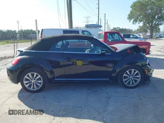 2015 Volkswagen Beetle with VIN 3VW5A7AT7FM811978, listed as a IAAI auction lot 41983986 with 84,421 mi miles and . Bid and sale history available at DreamBid. Image 13.