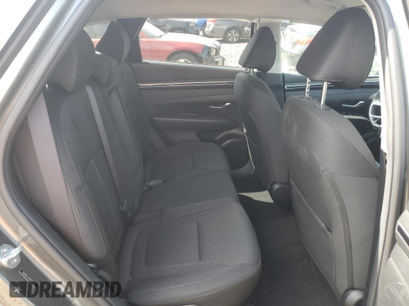 2023 Hyundai Tucson SEL z VIN 5NMJBCAE1PH272772, wystawiony jako Copart lot #56799805 z przebiegiem 20 041 mil mil oraz Szkoda całkowita • Salvage title. Historia ofert i sprzedaży dostępna na DreamBid. Obrazek 10.