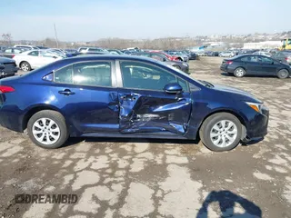2023 Toyota Corolla Hybrid LE with VIN JTDBCMFE7PJ005985, listed as a IAAI auction lot 41574856 with 31,568 mi miles. Bid and sale history available at carsss.com. Image 13.