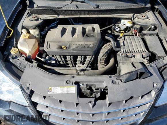 2010 Chrysler Sebring Limited with VIN 1C3CC5FB4AN111539, listed as a Copart auction lot 87454994 with 53,979 mi miles and Salvage Title. Bid and sale history available at DreamBid. Image 11.