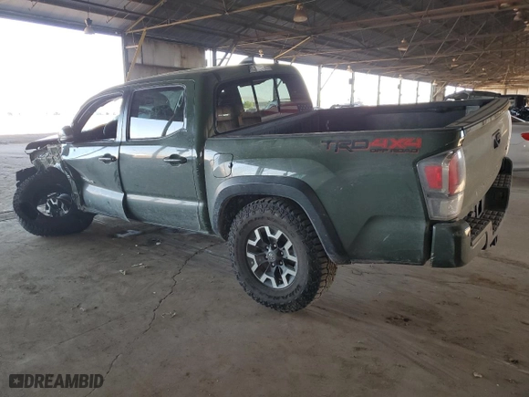 2022 Toyota Tacoma 4WD SR with VIN 3TYCZ5AN0NT055986, listed as a Copart auction lot 50165995 with 52,628 mi miles and Salvage Title. Bid and sale history available at carsss.com. Image 2.