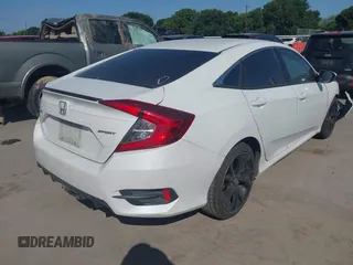 2019 Honda Civic Sport with VIN 19XFC2F81KE024702, listed as a IAAI auction lot 42018077 with 98,613 mi miles and . Bid and sale history available at DreamBid. Image 4.