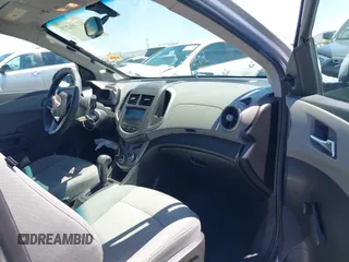 2014 Chevrolet Sonic LS with VIN 1G1JA6SH1E4135729, listed as a IAAI auction lot 42169273 with 74,969 mi miles and . Bid and sale history available at DreamBid. Image 5.
