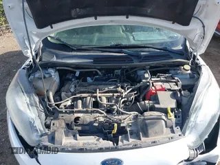 2019 Ford Fiesta SE z VIN 3FADP4BJ9KM136689, wystawiony jako IAAI lot #42095835 z przebiegiem 80 856 mil mil oraz . Historia ofert i sprzedaży dostępna na DreamBid. Obrazek 10.