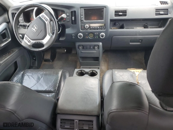 2006 Honda Ridgeline RTL with VIN 2HJYK16516H562690, listed as a Copart auction lot 66073094 with 211,924 mi miles and Salvage Title. Bid and sale history available at carsss.com. Image 8.