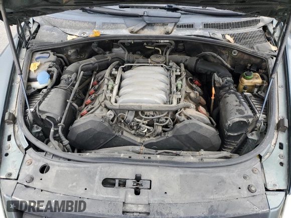 2004 Volkswagen Touareg with VIN WVGCM67L04D027410, listed as a Copart auction lot 79044964 with 100,509 mi miles and Salvage title. Bid and sale history available at DreamBid. Image 13.