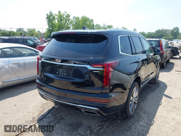 2021 Cadillac XT6 Premium Luxury with VIN 1GYKPDRS0MZ153523, listed as a IAAI auction lot 42770895 with 19,843 mi miles and . Bid and sale history available at DreamBid. Image 4.