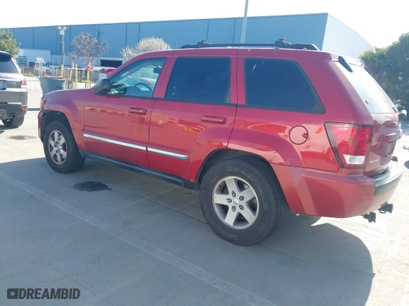 2010 Jeep Grand Cherokee Laredo with VIN 1J4PS4GK4AC121454, listed as a IAAI auction lot 41759966 with 69,390 mi miles. Bid and sale history available at carsss.com. Image 3.