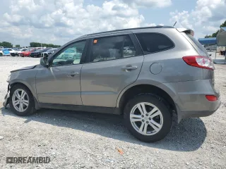 2012 Hyundai Santa Fe SE with VIN 5XYZHDAG2CG106869, listed as a Copart auction lot 75944384 with 186,373 mi miles and Salvage Title. Bid and sale history available at carsss.com. Image 2.