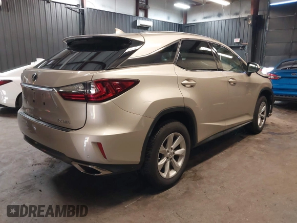 2017 Lexus RX 350 z VIN 2T2BZMCAXHC064652, wystawiony jako IAAI lot #42524586 z przebiegiem 70 702 mil mil oraz . Historia ofert i sprzedaży dostępna na DreamBid. Obrazek 4.