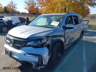 2021 Honda Pilot Special Edition with VIN 5FNYF6H26MB051293, listed as a IAAI auction lot 40665142 with 75,119 mi miles. Bid and sale history available at carsss.com. Image 2.