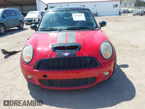 2010 MINI Hardtop S with VIN WMWMF7C51ATX43277, listed as a IAAI auction lot 42107871 with 102,886 mi miles and . Bid and sale history available at DreamBid. Image 6.
