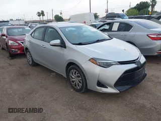 2018 Toyota Corolla L z VIN 5YFBURHE3JP840735, wystawiony jako IAAI lot #42095260 z przebiegiem 91 153 mil mil oraz . Historia ofert i sprzedaży dostępna na DreamBid. Obrazek 1.