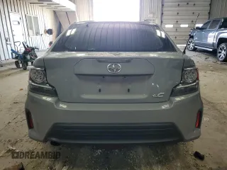 2014 Scion tC z VIN JTKJF5C71E3071683, wystawiony jako Copart lot #50971055 z przebiegiem Nie podano mil oraz Nie do naprawy • Non repairable. Historia ofert i sprzedaży dostępna na DreamBid. Obrazek 6.