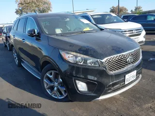 2016 Kia Sorento SXL z VIN 5XYPK4A50GG115809, wystawiony jako IAAI lot #42549327 z przebiegiem 102 958 mil mil oraz . Historia ofert i sprzedaży dostępna na DreamBid. Obrazek 1.