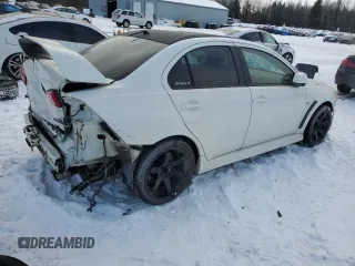 2010 Mitsubishi Lancer Evolution GSR with VIN JA32W8FV4AU604717, listed as a Copart auction lot 83896464 with 140,502 mi miles and Salvage Title. Bid and sale history available at DreamBid. Image 3.