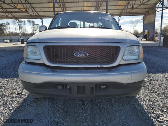 2003 Ford F-150 XL with VIN 1FTRX07W03KB17955, listed as a Copart auction lot 83061424 with 164,529 mi miles and Salvage Title. Bid and sale history available at carsss.com. Image 5.