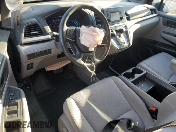 2019 Honda Odyssey LX with VIN 5FNRL6H24KB023597, listed as a Copart auction lot 81958364 with 135,347 mi miles and Salvage Title. Bid and sale history available at DreamBid. Image 8.