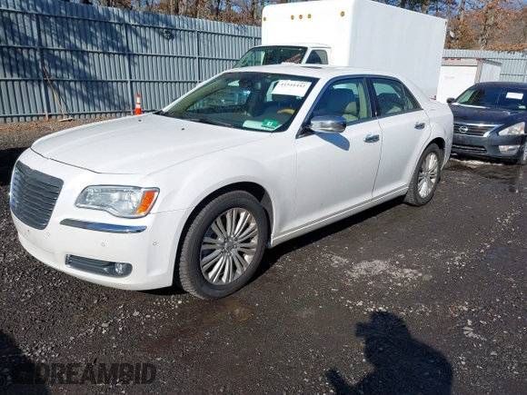 2013 Chrysler 300 with VIN 2C3CCAKGXDH733148, listed as a IAAI auction lot 41541442 with 216,074 mi miles. Bid and sale history available at carsss.com. Image 2.