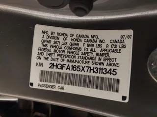 2007 Honda Civic Sdn LX with VIN 2HGFA165X7H311345, listed as a IAAI auction lot 41347507 with 109,411 mi miles. Bid and sale history available at carsss.com. Image 9.