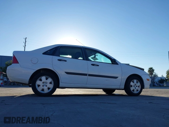 2007 Ford Focus S with VIN 1FAHP34N67W244433, listed as a IAAI auction lot 41539078 with 107,318 mi miles and . Bid and sale history available at DreamBid. Image 13.