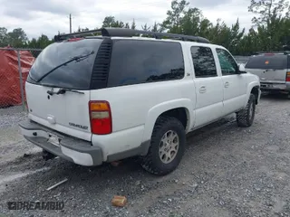 2003 Chevrolet Suburban LT with VIN 3GNFK16Z23G280270, listed as a IAAI auction lot 41627119 with 246,282 mi miles. Bid and sale history available at carsss.com. Image 4.