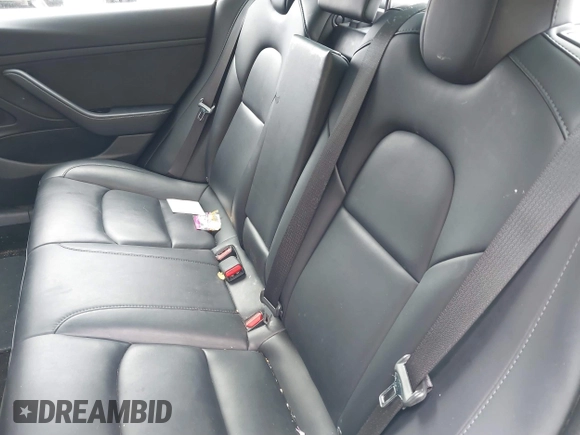 2020 Tesla Model 3 Standard Range Plus with VIN 5YJ3E1EA1LF658521, listed as a IAAI auction lot 41804722 with 83,248 mi miles and . Bid and sale history available at DreamBid. Image 8.