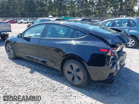 2022 Tesla Model 3 Long Range with VIN 5YJ3E1EB7NF241996, listed as a IAAI auction lot 42115915 with 23,433 mi miles and . Bid and sale history available at DreamBid. Image 3.