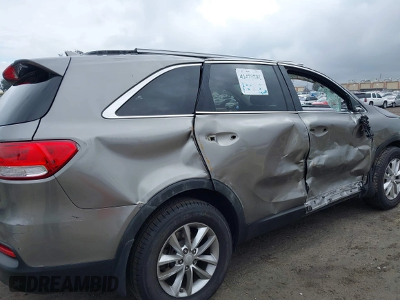 2016 Kia Sorento LX with VIN 5XYPG4A35GG149678, listed as a IAAI auction lot 41478731 with 128,895 mi miles. Bid and sale history available at carsss.com. Image 18.
